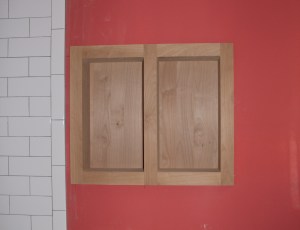 This wall cabinet is in the girl's bathroom.  I admire the clean appearance now -- knowing that 2 months from now it will be overflowing with "product."