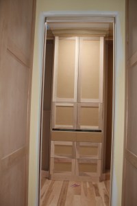 A view from the kitchen into the pantry