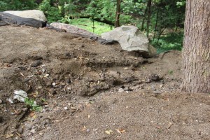 A close up of the erosion.  The rocks in the background are from the retaining wall.