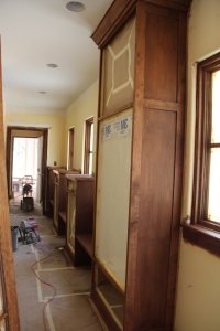 A shot of the front hall cabinetry, looking towards the garage.