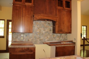 The stone backsplash is up in the kitchen! 